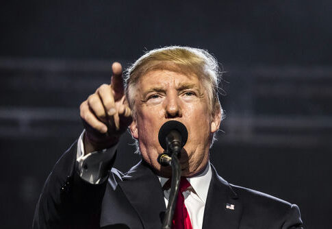 I dont know who this is person pointing during a speech.