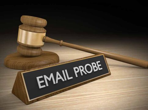 Judge’s gavel beside a nameplate reading EMAIL PROBE